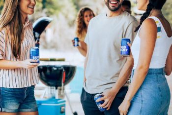 Friends drinking Bud light at a barbeque